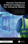 Text: "Human-Centered Artificial Intelligence For Industrial Safety". Ein Mensch in Warnweste vor technischem Hintergrund., Buch