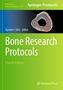 "Bone Research Protocols, Fourth Edition" von Aymen I. Idris. Grünes Cover mit buntem Zellbild und Humana Press Logo., Buch