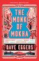 Titel: "The Monk of Mokha". Autor: Dave Eggers. Rote und blaue Illustration mit Gebäuden und einem Kleidungsstück., Buch