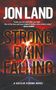 Jon Land: Strong Rain Falling, Buch