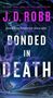 „J. D. Robb. Bonded in Death.“ Lila Titel auf nebligem Hintergrund, unten Stadtansicht bei Nacht.