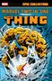 Logo: Marvel. Text: Marvel Two-in-One Presents The Thing. Darunter eine orange-blaue Figur in Aktion mit zerstörtem Hintergrund., Buch