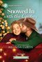 Text: "Snowed In with the Cowboy" von Melinda Curtis. Ein Mann mit Cowboyhut küsst lächelnde Frau vor verschwommenen Lichtern., Buch
