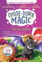 "Upside Down Magic: The Big Shrink", "Huge magic, tiny driten." Katze vor großen Gegenständen umgeben von magischen Elementen.