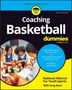 „Coaching Basketball for Dummies“ zeigt lächelnde Jugendliche im Kreis in Sportkleidung mit einem Basketball., Buch