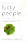 Titel: "lucky people". Leitfaden eines Neurowissenschaftlers. Marienkäfer auf Kleeblatt. Autor: nobuko nakano.