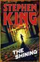 "Stephen King" oben, "The Shining" unten. Silhouette eines Kindes im hell erleuchteten Flur.