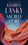 "KATHRYN LASKY SACRED LIGHT" ist ein Buchcover mit bunten, geschwungenen Felsen und einem fliegenden Vogel.