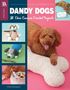 "DANDY DOGS: 14 Chic Canine Crochet Projects. Hund spielt mit großem, gehäkeltem Knochen auf rosa Hintergrund.", Buch