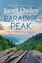 Text: "Janet Dailey, Paradise Peak, New Americana Series". Eine schöne Berglandschaft mit Bäumen und Felsen bei Sonnenuntergang.