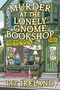Text: "Cover to be revealed soon! MURDER AT THE LONELY GNOME BOOKSHOP by Liz Ireland." Unten ein blaues Logo mit Buch., Buch