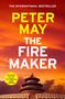Buchcover mit Text: "THE INTERNATIONAL BESTSELLER, PETER MAY, THE FIRE MAKER." Ein Tempel vor einem orangen Himmel.