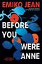Titel "Before You Were Anne" in Weiß, Autor "Emiko Jean" in Rot. Blaue und orange Blätter sowie ein gesichtshafter Umriss.