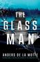 „The Glass Man: A Novel“ von Anders de la Motte. Unebene Silhouette vor einem blauen Hintergrund mit zersplittertem Glas., Buch