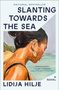 Text: "SLANTING TOWARDS THE SEA, A Novel, Lidija Hilje." Illustration: Frau am Meer, Haare hochgesteckt, goldene Ohrringe.