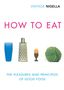 HOW TO EAT; VINTAGE NIGELLA. Ein Stapel blaue Becher, eine Reibe, ein Ei im Halter, ein Kohlkopf.