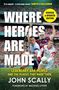 „Where Heroes Are Made“ in großen Buchstaben, darunter „Legendary GAA People“. Drei Sportler in Aktion im Stadion.