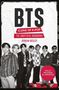 Text: "BTS Icons of K-Pop", "The Unofficial Biography", "Adrian Besley", "Fully Revised & Updated." Sieben Personen posieren., Buch