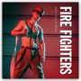 "2027 CALENDAR FIRE FIGHTERS" steht auf der rechten Seite. Ein muskulöser Mann in Feuerwehrkleidung posiert.