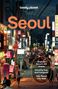 Oben steht "lonely planet", darunter groß "Seoul". Eine belebte nächtliche Straßenszene mit vielen Neonlichtern.