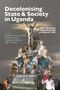 Text: "Decolonising State & Society in Uganda. The Politics of Knowledge & Public Life. Edited by Katherine Bruce-Lockhart..."

Große Skulptur vor bewölktem Himmel, Menschen jubeln auf einem Fahrzeug., Buch