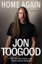 „HOME AGAIN“, „a memoir“, „JON TOOGOOD“, „My life and times in a band called Shihad“. Ein Mann mit Gitarre und langen Haaren., Buch
