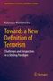 Titel: "Towards a New Definition of Terrorism". Autor: Katarzyna Maniszewska. Hintergrund: Weltkarte mit Radarlinien., Buch