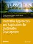 Titel: "Innovative Approaches and Applications for Sustainable Development". Solarzellen und Windturbine vor Skyline., Buch