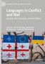 "Languages in Conflict and War" behandelt Sprachen in der Ukraine, im Kaukasus und im Baltikum. Graffiti mit internationalen Flaggen., Buch