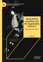 "Young Artists, Innovation and the Organization, Volume II" von Elen Riot. Schwarz-weißes Bild eines Artisten auf Bühne., Buch