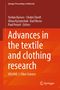 Buchtitel: "Advances in the textile and clothing research, Volume 1: Fiber Science". Oranger Hintergrund mit Text in Weiß., Buch