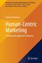 "Human-Centric Marketing: A Humanistic Approach to Business" steht in großer weißer Schrift auf einem orangefarbenen Hintergrund., Buch