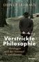 "Oliver Jahraus: Verstrickte Philosophie. Heidegger und der Nationalsozialismus." Ein Mann geht mit Stock in einen Waldweg., Buch