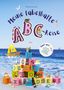 "Meine fabelhafte ABC-Reise" und "Mach mich bunt!" auf Bausteinen am Strand mit Tieren und Figuren.
