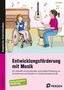 „Entwicklungsförderung mit Musik“ steht im Zentrum. Illustration von zwei Kindern musizierend. Ein Kind im Rollstuhl., Buch