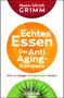 "Echtes Essen: Der Anti Aging Kompass. Wie wir jünger und gesünder bleiben. Oben rote Frucht, unten grüne Kiwi."