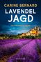 "CARINE BERNARD - LAVENDELJAGD - Ein Provence-Krimi" vor einem Lavendelfeld und einem Dorf im Hintergrund., Buch
