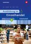 "Ausbildung im Einzelhandel, Arbeitsheft. Eine lächelnde Frau in einer Schürze steht in einem Geschäft.", Buch