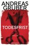 „ANDREAS GRUBER TODESFRIST THRILLER GOLDEMANN“ in Weiß auf rotem Hintergrund. Eine große, dunkle Schere ziert das Bild., Buch