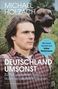 "Michael Holzach: Deutschland umsonst. Zu Fuß und ohne Geld durch ein Wohlstandsland. Mit Vorwort von Volker Weidermann." Ein Mann mit einem Hund.