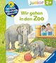 „Wir gehen in den Zoo“. Illustration mit zwei Elefanten, einem roten Ball, zwei Kindern auf einem Steg und bunter Schrift., Buch