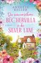 Text: "Annette Keller. Die verwunschene Büchervilla in der Silver Lane. Roman. Piper." Eine idyllische Villa umgeben von Blumen., Buch