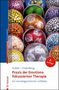 Titel: "Praxis der Emotionsfokussierten Therapie" von Sutter und Greenberg. Bunte, gemusterte Schalen in einem Kreis., Buch