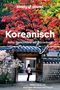 "Koreanisch. Reise-Sprachführer mit Wörterbuch. Extra-Karte mit wichtigen Wörtern und Fragen."  
Blick durch ein traditionelles Tor auf blühende Bäume., Buch