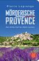 „Mörderische Provence“ von Pierre Lagrange. Lavendelfeld und Dorf auf einem Hügel mit klarem Himmel., Buch