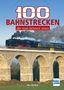 "100 Bahnstrecken, die man kennen muss". Ein Zug auf einem steinernen Viadukt, viel Rauch, blauer Himmel., Buch