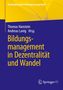Bildungsmanagement in Dezentralität und Wandel; Autoren: Thomas Hanstein, Andreas Lanig; gelb-blaues Design., Buch