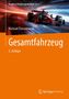 "Handbuch Rennwagentechnik Band 2", "Michael Trzesniowski", "Gesamtfahrzeug 3. Auflage". Rennwagen auf roter Strecke., Buch
