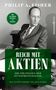 „Reich mit Aktien“ in großen Buchstaben, Bild eines Mannes im Anzug., Buch
