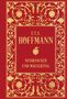 "E.T.A. Hoffmann, Nussknacker und Mausekönig". Goldene Ornamente auf rotem Hintergrund, florale Muster., Buch